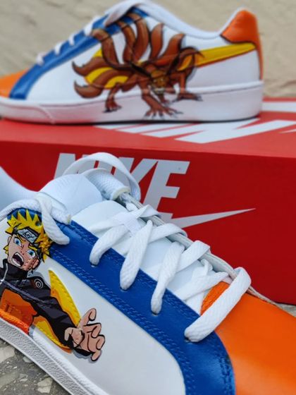A shot showing both shoes of the Naruto custom, with Naruto on one and Kurama on the other.