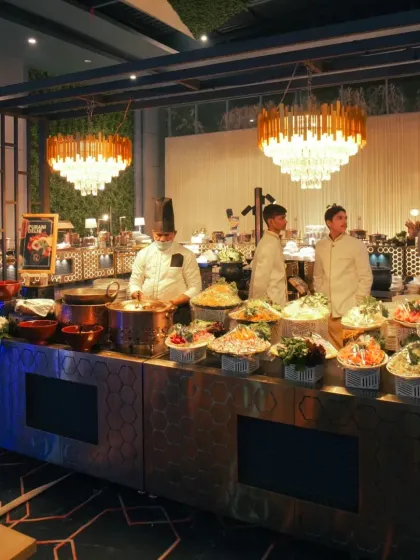 A live food station at an event, capturing the chefs in action. I also focus on the culinary experience of your celebration.