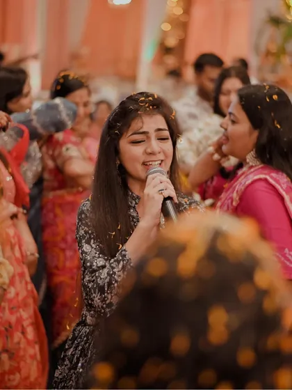 A candid moment interacting with guests during a performance in Raipur. I love connecting with my audience personally.