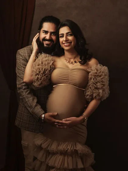This is one of my favorite setups, where classic elegance meets modern love. The couple's joy is palpable, framed by rich, painterly tones that turn their portrait into a masterpiece.
