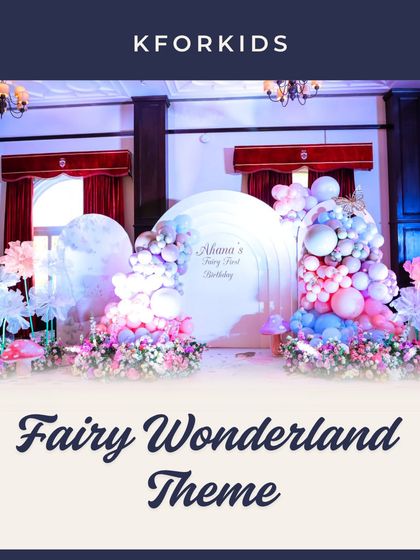 A dreamy Fairy Wonderland theme, perfect for a magical celebration. This setup features ethereal pastel balloon arches, oversized paper flowers, and soft lighting to create a whimsical forest atmosphere.