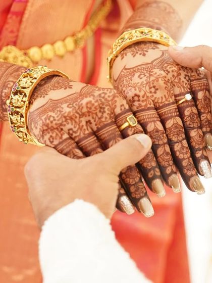 Another beautiful shot from the engagement ceremony, highlighting the bride's elegant henna.