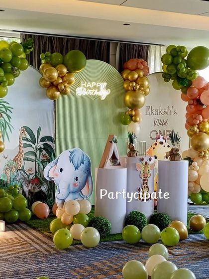 Another view of the safari stage, showing the light-up number '1' and the arrangement of cute animal props. The large window in the background brought in beautiful natural light.