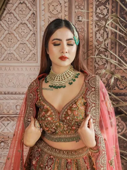 A moment of reflection. Even with eyes closed, the makeup is flawless, with perfectly blended eyeshadow and a smooth, radiant base.