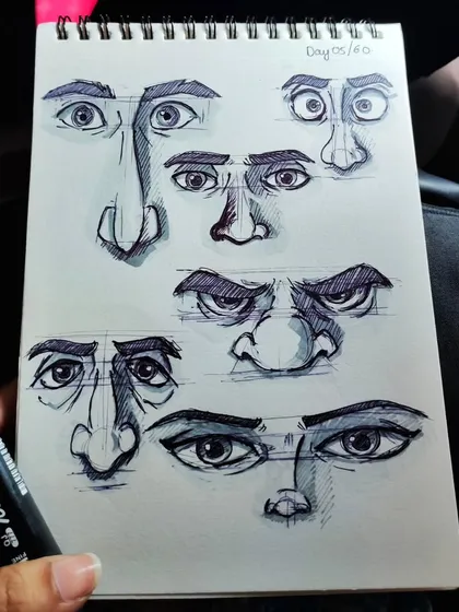 The eyes and nose tell so much of the story. Here's a page from my sketchbook where I practiced drawing different expressions and face shapes.