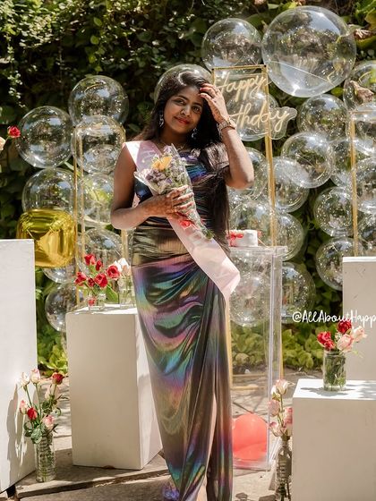 Another gorgeous photo of the birthday girl enjoying her special day with our unique bubble backdrop.
