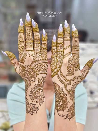 A full view of the Indo-Arabic design, showing how the patterns on both hands complement each other while maintaining their unique elements.