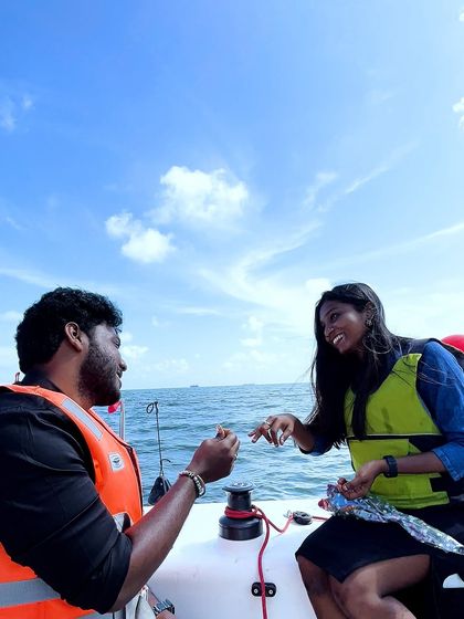 The pure joy and excitement of a successful surprise proposal on a yacht.