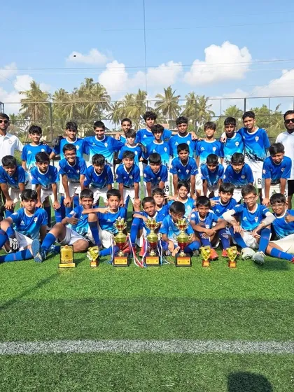 Our victorious U12 and U14 teams and coaches pose together on the pitch in Goa, celebrating a successful tournament filled with skill, sportsmanship, and teamwork.