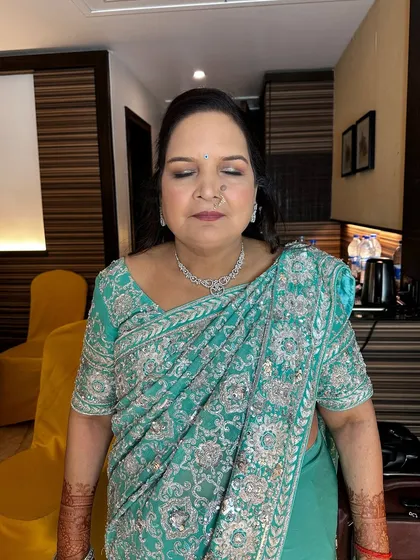 Another beautiful makeover by TeamASM for a family member, ensuring she looks her best for the wedding.