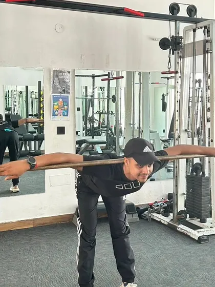 A focused shot of the good morning exercise, a key part of our functional fitness training.