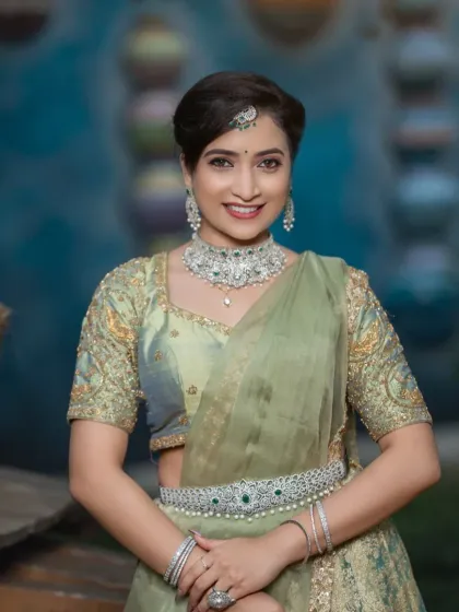 A classic portrait showing the beautiful, radiant finish of the makeup.