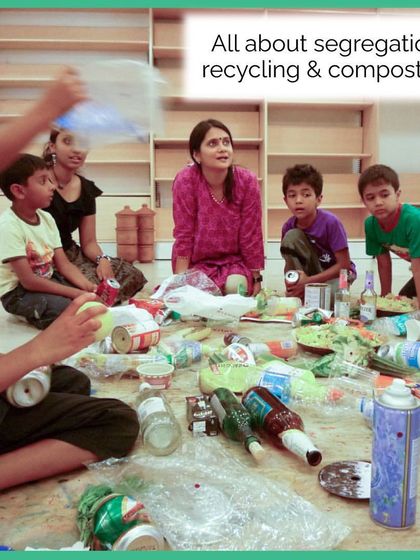 A group of children learning all about segregation, recycling, and composting in one of our workshops. We use real-world items to make the lesson tangible and easy to understand.