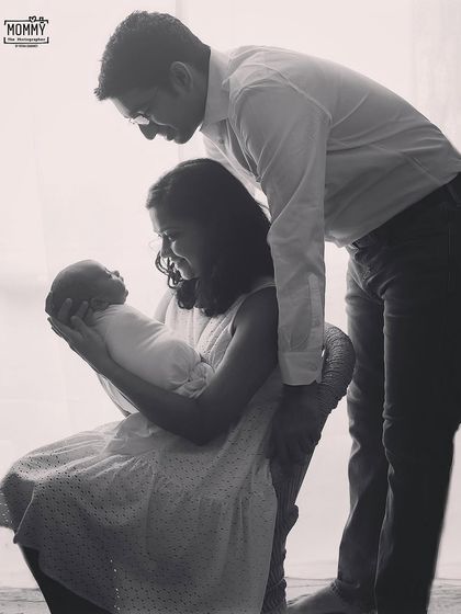 Happiness is homemade. This backlit, black and white portrait of a new family is so dreamy and emotional. It feels like they are in their own little bubble of love.