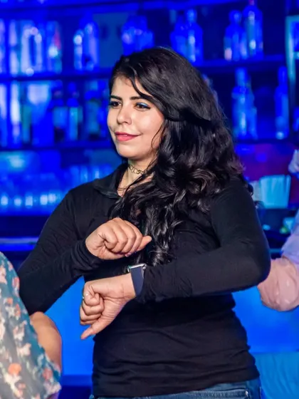 A guest showing off her moves on the dance floor. The energy is always high during our DJ nights.