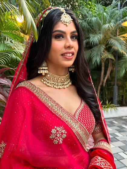 A close-up of Kanika's elegant matte makeup. It’s a sophisticated choice that photographs beautifully and never goes out of style.
