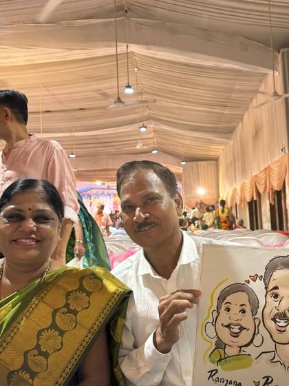 A lovely couple holding their caricature, a sweet memento from a wedding event.