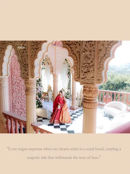 A beautiful shot of the bride on a palace balcony, framed by intricately carved pillars. The text overlay speaks of a royal bond and a majestic tale.