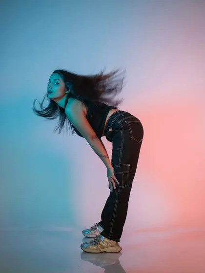 A slightly different moment from the hair flip sequence, showing the beautiful motion blur of the hair.
