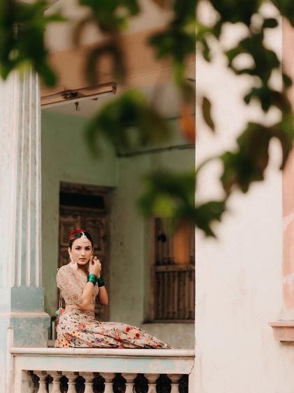A quiet moment of a bride we styled for an intimate wedding. The floral lehenga and simple jewelry create a look that is effortlessly beautiful and perfect for a daytime ceremony.