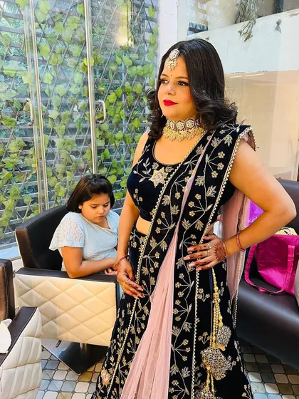 Beyond bridal, I love creating glamorous looks for any special occasion. This client was ready for her engagement party with a bold lip, defined eyes, and a hairstyle that complemented her beautiful velvet lehenga.
