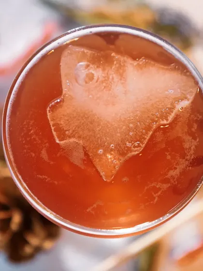 Getting into the festive spirit with a custom Christmas cocktail. This drink features a unique Christmas tree shaped ice cube, showing the small details I bring to make your seasonal party special.
