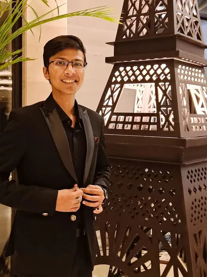 Posing next to a miniature Eiffel Tower after the Panasonic show. Every event has its own unique charm.