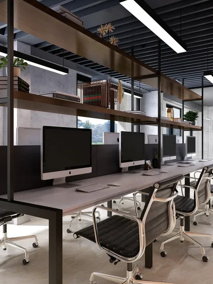 Another angle of the workstations, showing the clean lines and functional layout. The design aligns with the company's culture and the needs of its employees.