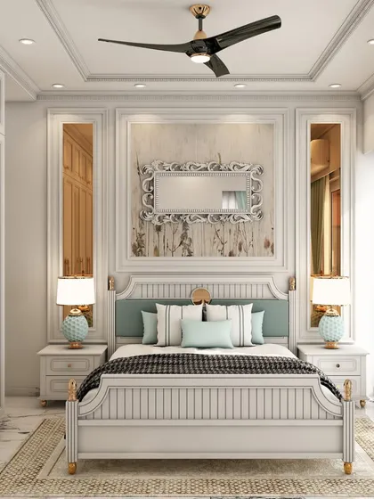 This traditional bedroom design features classic wall paneling, ornate mirrors, and a beautifully crafted bed frame, creating a timeless and elegant atmosphere.