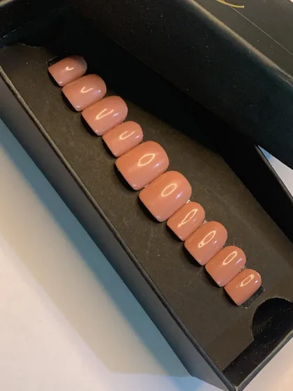 A close-up of the glossy finish on my 'Smoothie' nude press-on nails. The square shape is practical and stylish, making it one of my most popular ready-to-wear options.