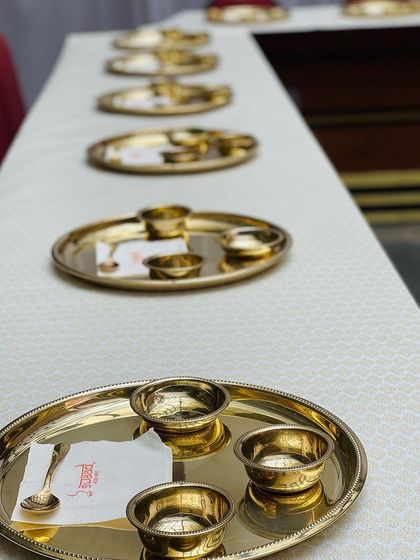 Another view of the elegant table setting for a formal sit-down dinner. This setup is ideal for corporate events, sangeets, and wedding receptions where a touch of class is desired.