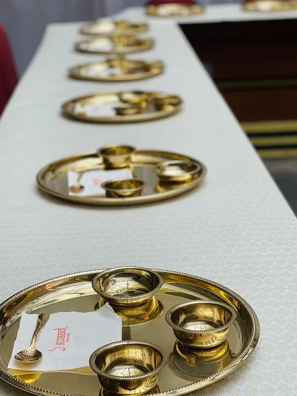 Another view of the elegant table setting for a formal sit-down dinner. This setup is ideal for corporate events, sangeets, and wedding receptions where a touch of class is desired.