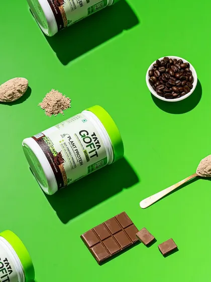 This is what we mean by a social media scroll-stopper. A vibrant flat lay for Tata GoFit's plant protein, using bold colors and deconstructed ingredients to create a visually exciting composition that's perfect for Instagram feeds.