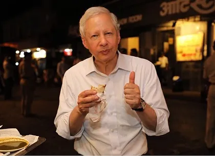 Former U.S. Ambassador Kenneth Juster giving a thumbs-up while enjoying our food. We were honoured to have him experience why Bademiya is a favourite among food lovers.