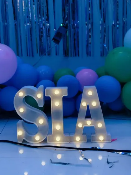 A close-up of our light-up marquee letters, a popular add-on for birthdays and anniversaries.