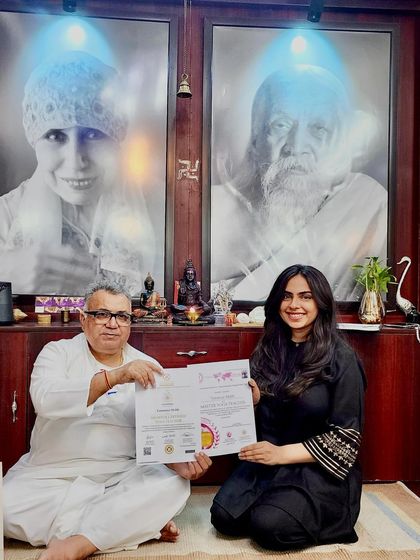 A proud moment, presenting a 500-level certificate alongside my guru, Swami Vidyanand ji. My teaching is rooted in a deep lineage, and I am honored to pass this knowledge on.