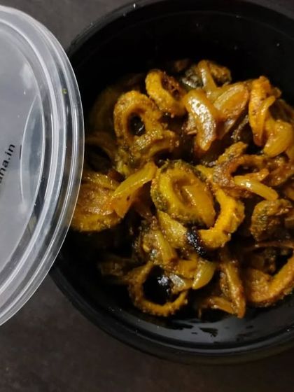 Our Karele ki Sabji, neatly packed in a container. We ensure that even the simplest dishes are prepared and delivered with the utmost care and hygiene.