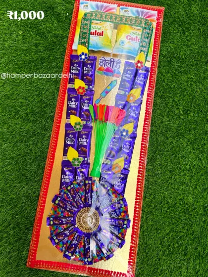This grand chocolate mala is perfect for making a statement! It's loaded with Dairy Milk chocolates and also includes gulal packets and water balloons for extra fun, all for ₹1000.