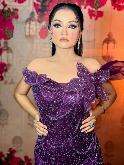 A full portrait of the model, looking fierce and confident. This is an example of my high-fashion and editorial makeup skills.