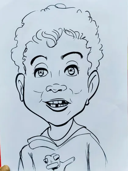 A funny caricature of a young boy with a gap-toothed smile. It's the little details that make it special.