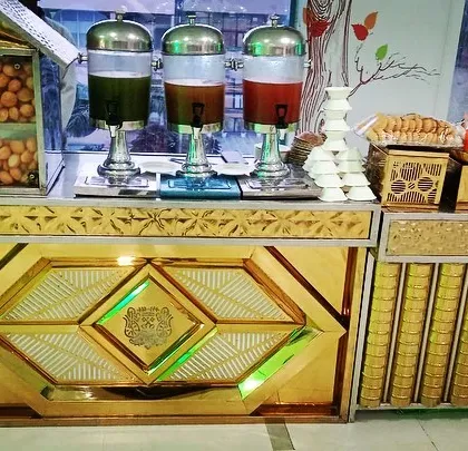 A beautiful, illuminated chaat counter ready for a corporate event. This setup is not only delicious but also serves as a stunning piece of decor.