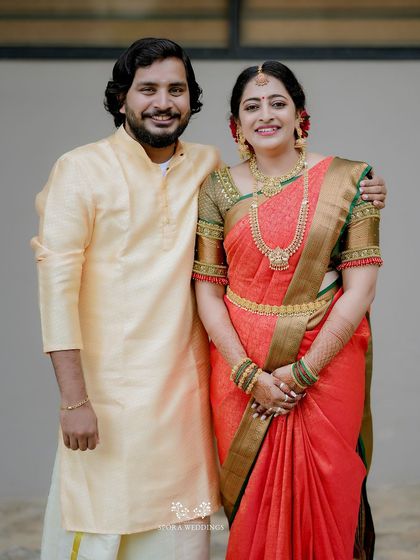 A classic portrait of the bride and groom, their smiles reflecting their happiness on this special day.