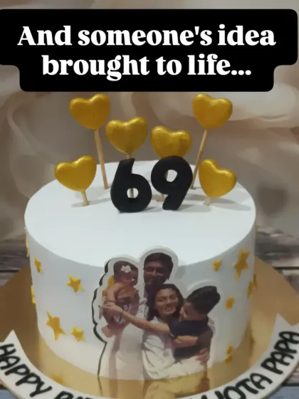 A 69th birthday cake that’s full of love. This design features a family photo, golden heart toppers, and edible stars, celebrating the person at the center of their family.