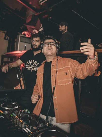 Hyping up the Halloween crowd. The energy at themed parties is always special, as everyone is ready to have fun.
