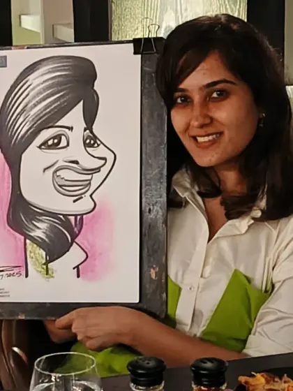 A guest at Nincasa with her portrait. The subtle color wash adds a nice touch to the black and white drawing.