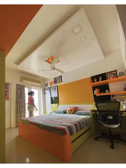 This angle highlights the practical layout, providing ample space for both rest and play, with easy access to the balcony.