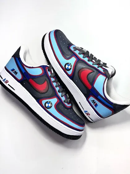 A clean and crisp BMW-themed Air Force 1. The design uses the iconic colors of the M series, with the logo painted on the side. Perfect for any car enthusiast.