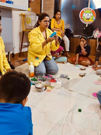 A hands-on craft session during one of our camps. We believe in learning by doing, and our instructors guide the kids every step of the way.