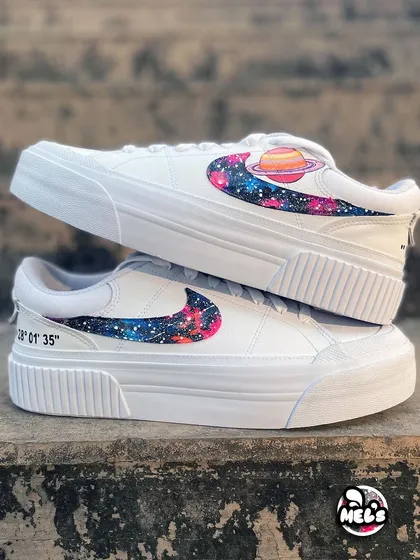 A stacked shot of the Saturn and galaxy swoosh custom Nikes.