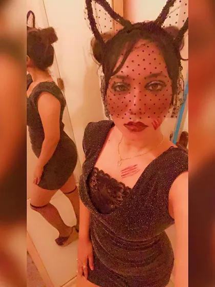 My "Black Cat" persona for a Halloween event at Flo Churchstreet. The makeup and accessories complete the look for a spooky night of music.